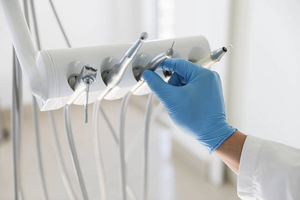 Professional Tooth Extraction technician working in Pittsboro, NC